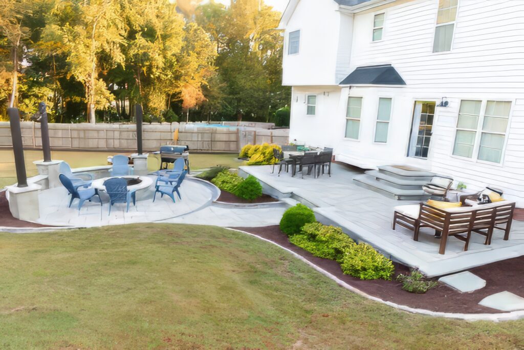 grass, patio, hardscape, flowers, and mulch