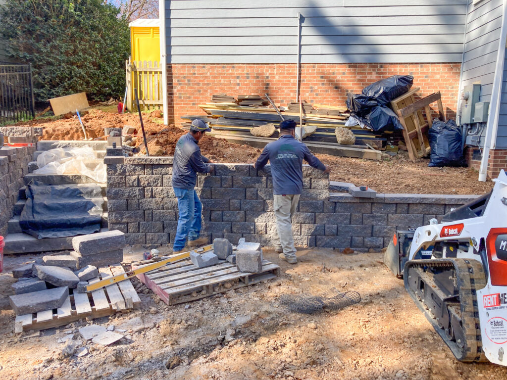 Stone retaining wall by Holly Springs NC landscaping company